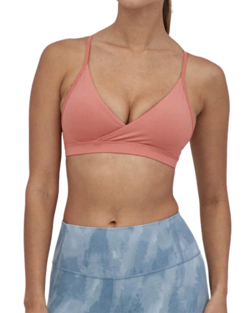 Front of a model wearing a size L Cross Beta Sports Bra in Sunfade Pink in Sunfade Pink by Patagonia. | dia_product_style_image_id:363334